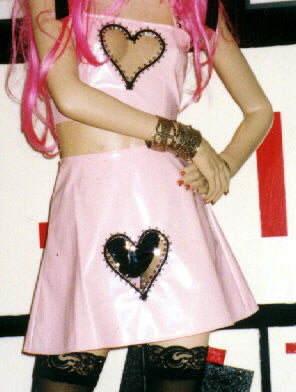 Short vinyl A line skirt with see through heart cut out